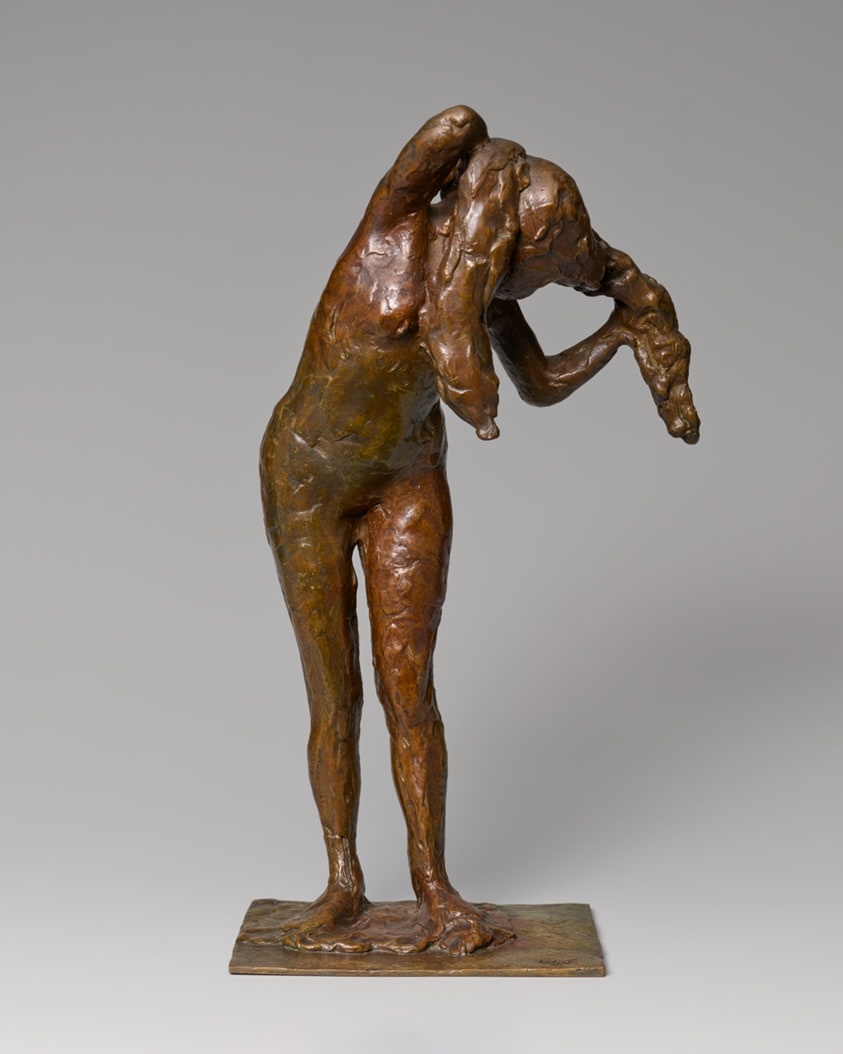 Woman Arranging Her Hair