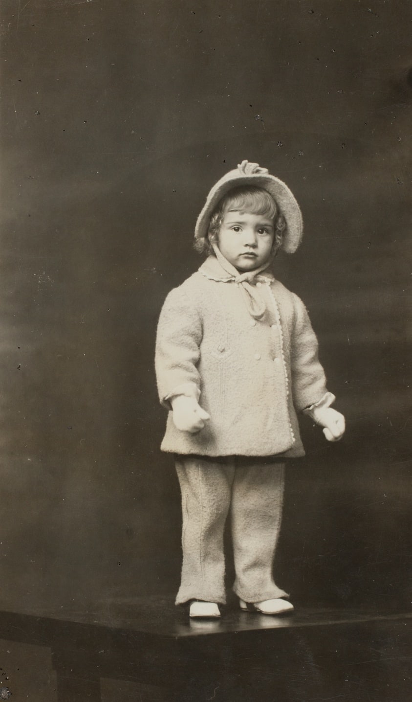 Girl in Winter Coat Standing on Table
