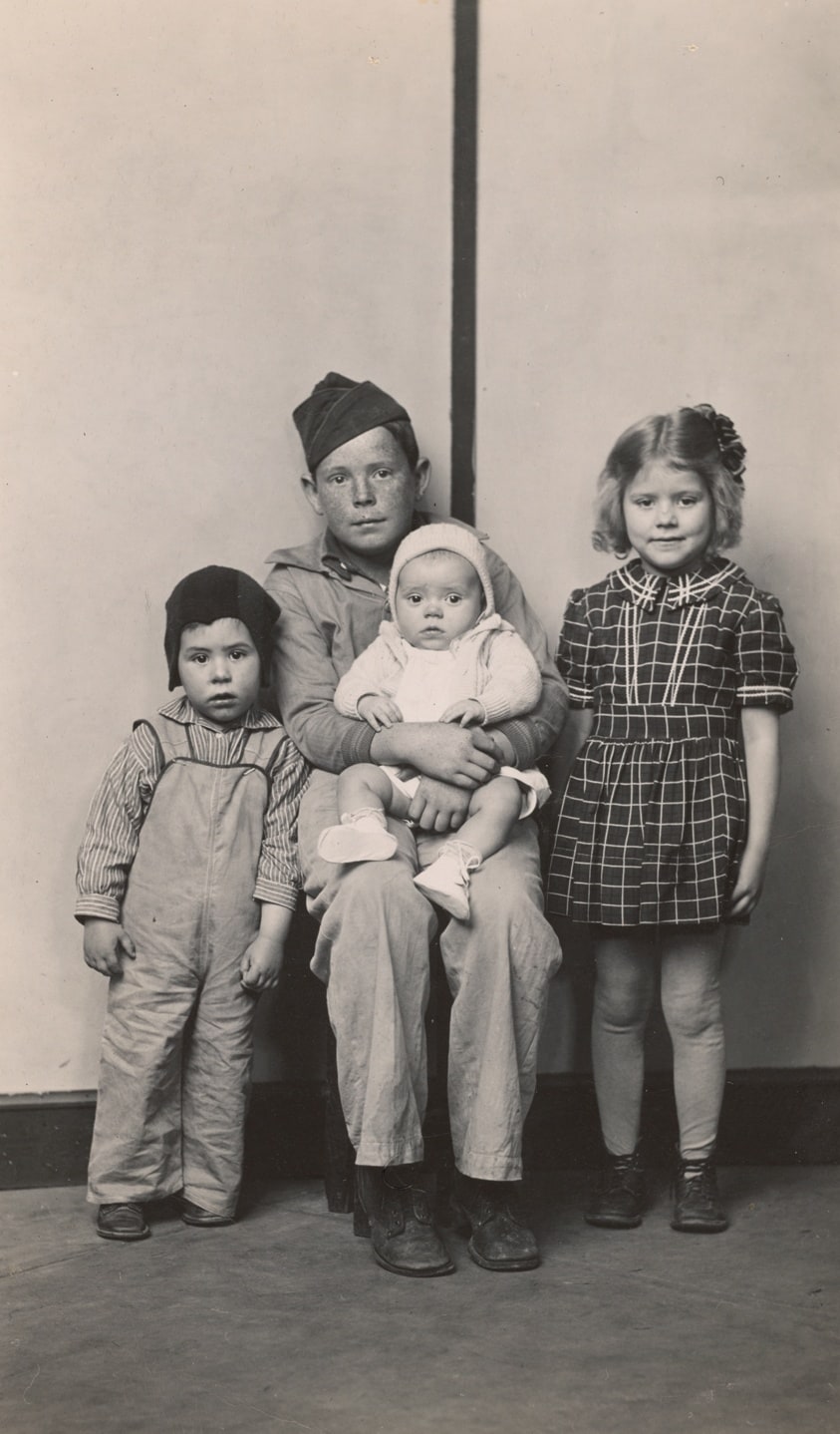 Four Seated Children, Striped background