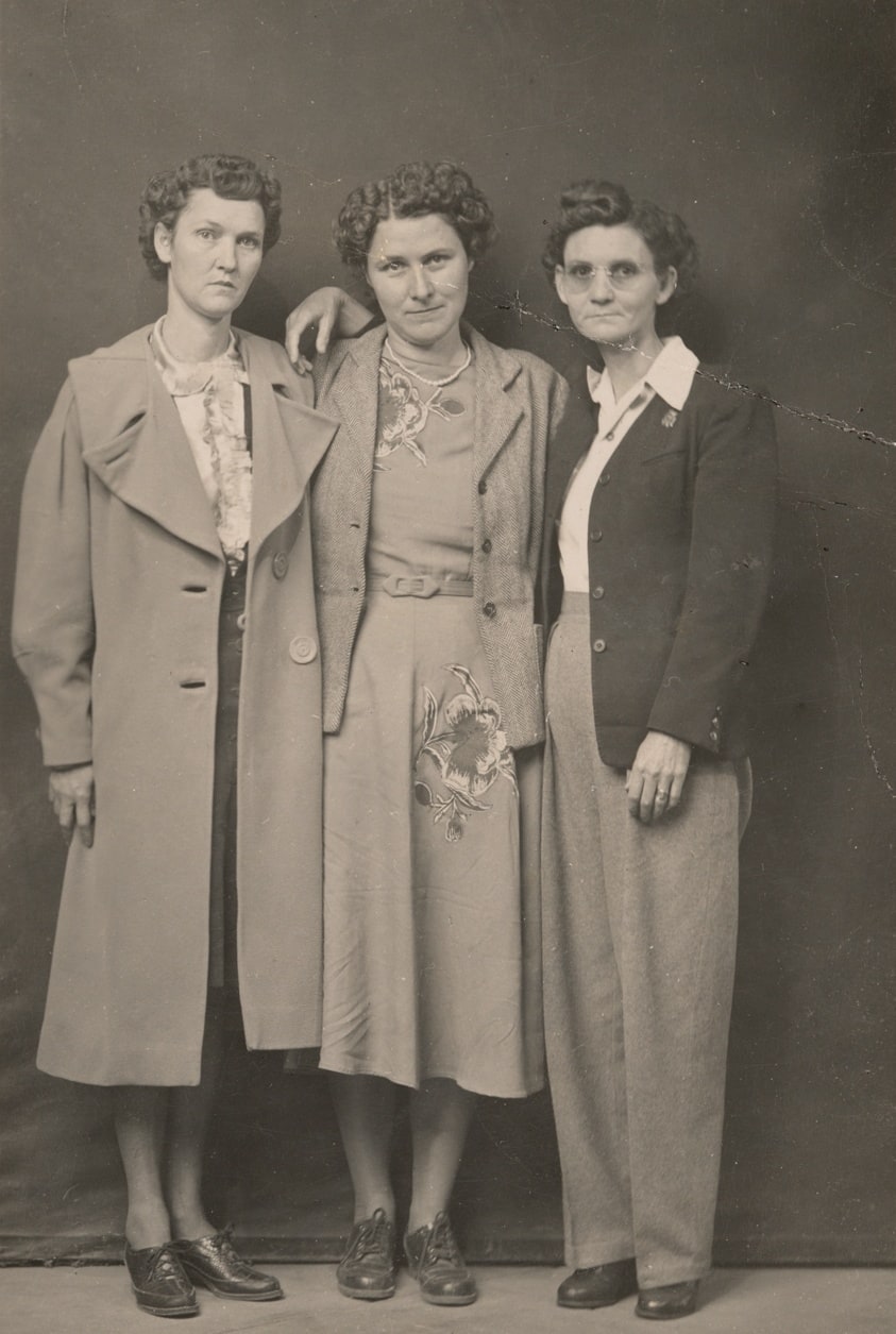 Three standing women