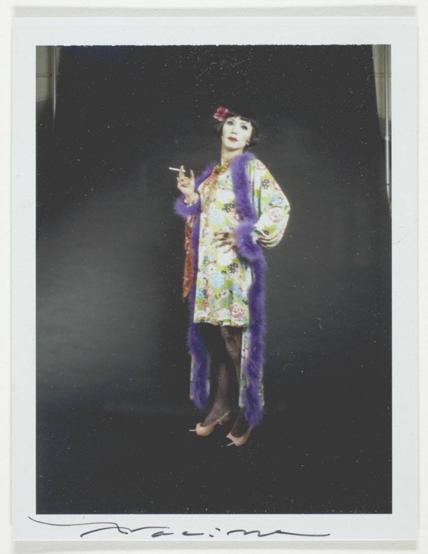 M Holding a Cigarette