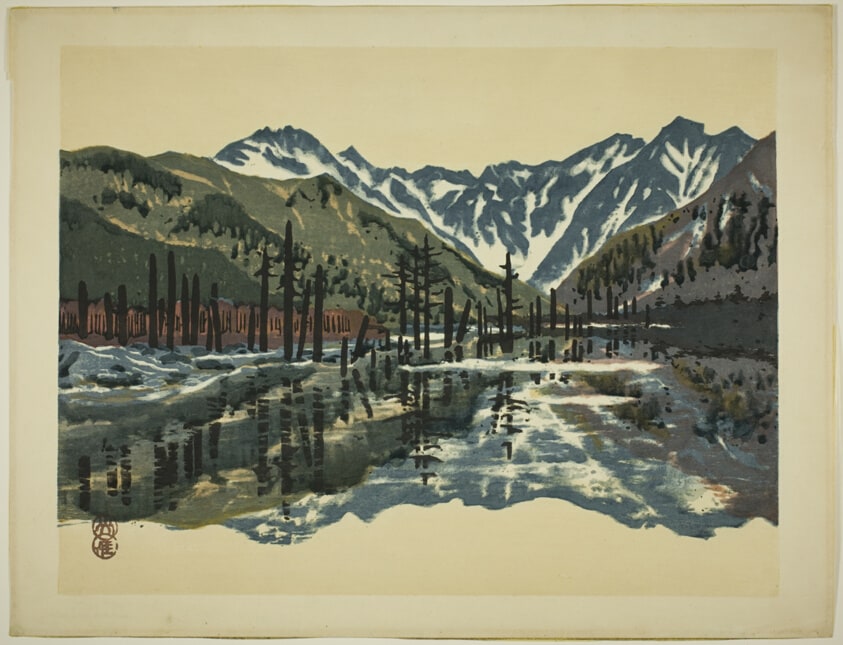 View of Mount Yakedake from Taisho Pond in Kamikochi in June