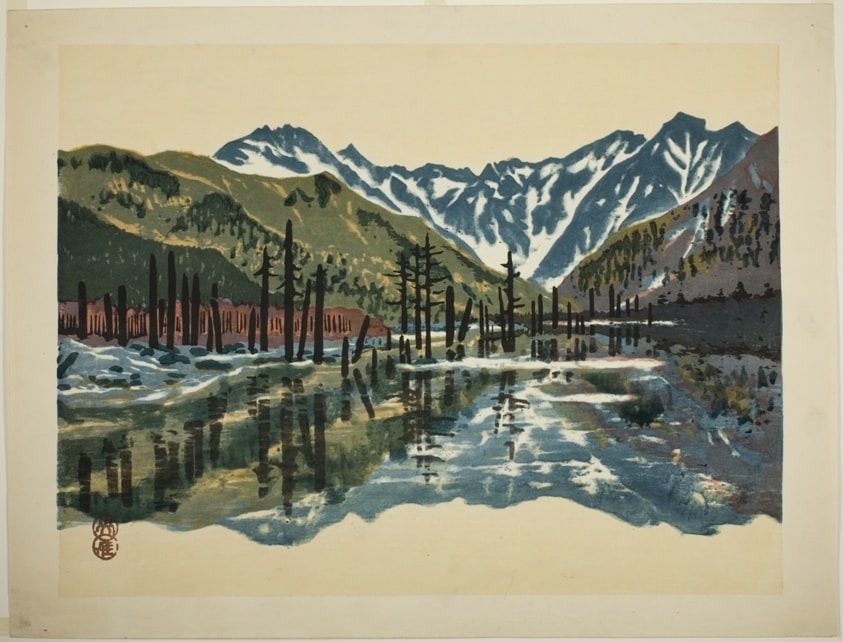 View of Mount Yakedake from Taisho Pond in Kamikochi in June