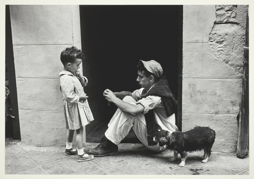 Pamploma: Man, Child and Dog in Doorway
