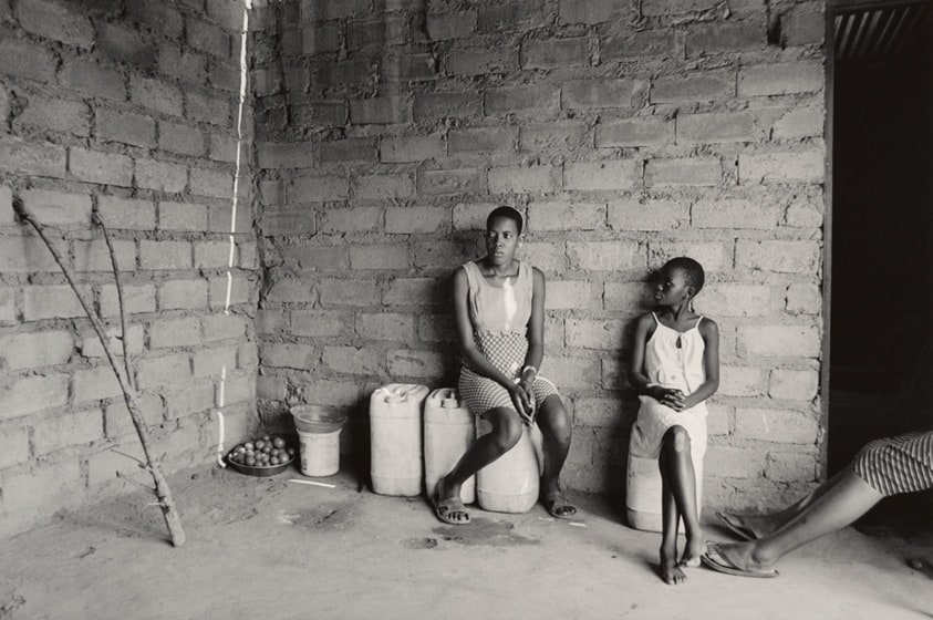 Elias (b. 1965) and Francinah (b. 1968) both deceased. Their home is left to the 4 children in Shiluvane, Tzaneen, three of whom are sitting in the front room/Dorah and Athalia who are sitting in the Front Room