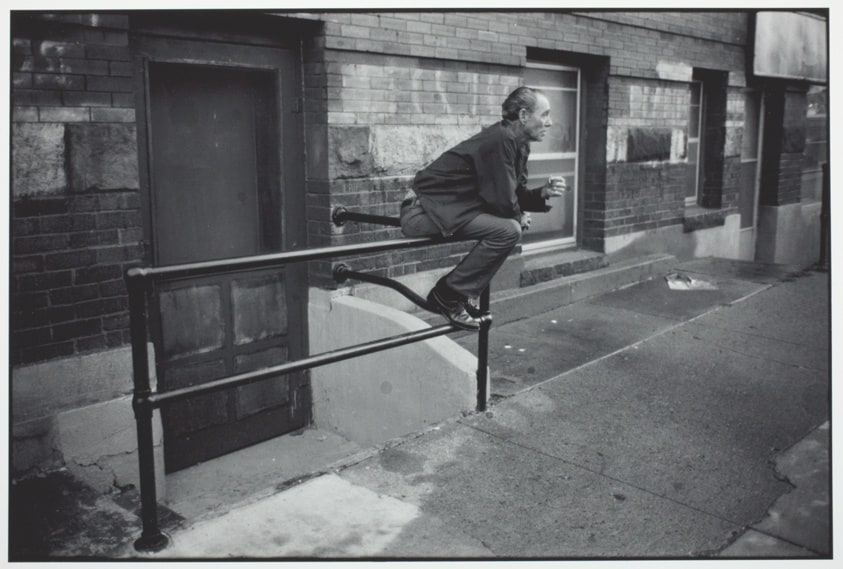 Man Sitting on a Railing, Kenosha Apartments, Minneapolis