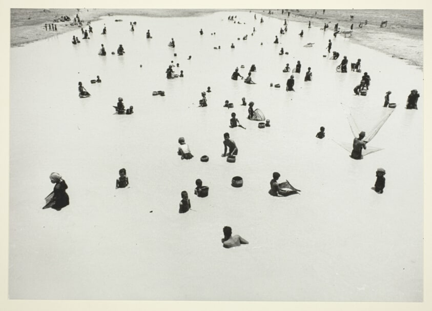 People in Opaque River, India