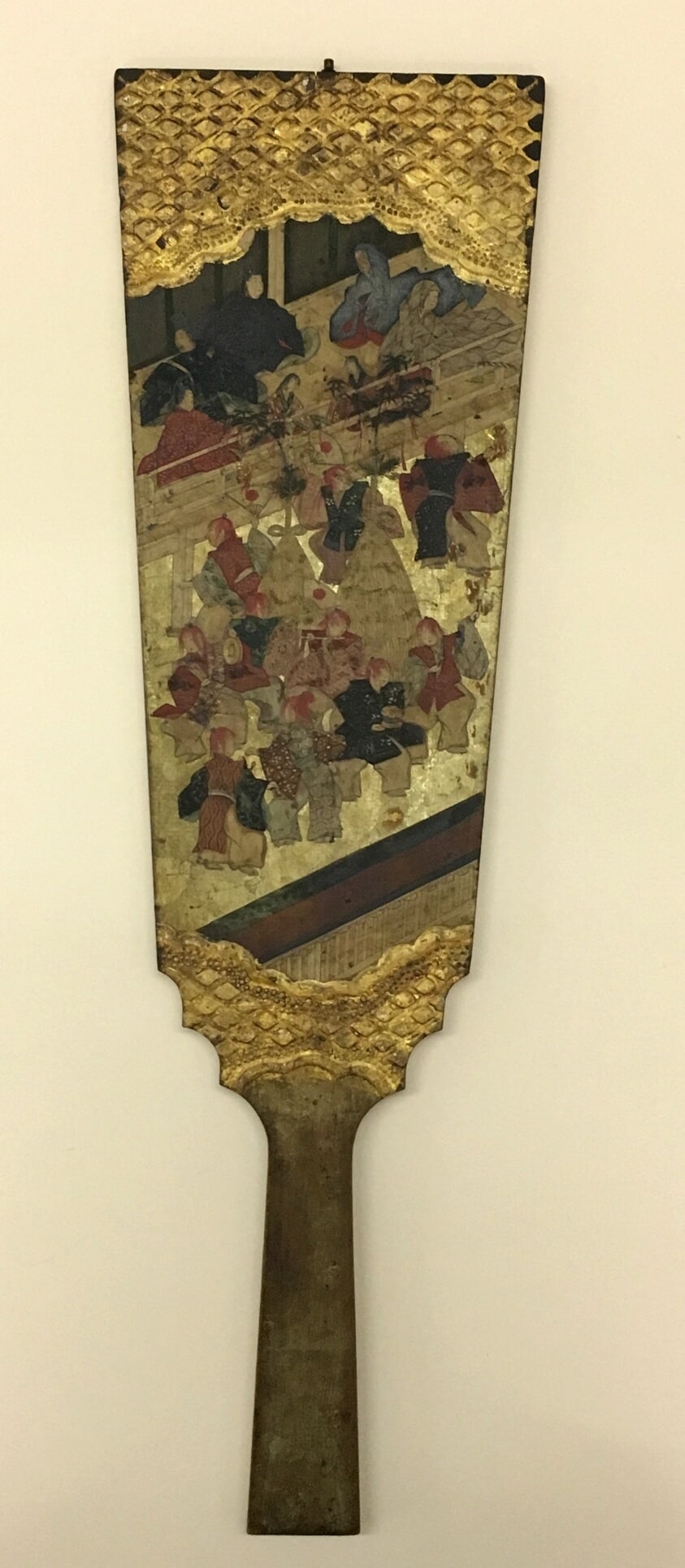 Battledore with design of figures