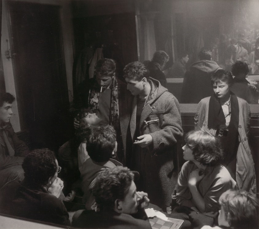 Girl Surrounded by Students in Saint-Germain-Des-Pres