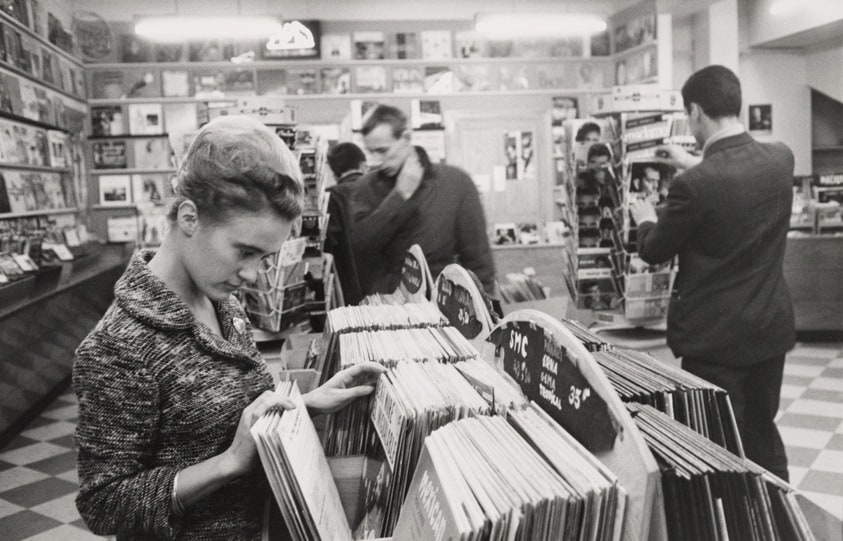 Affluences in Europe: with the new wave of prosperity, trade or luxury items flourish. Record sales are soaring, despite their relatively high price. This big store on the Champs Elysees is open seven days a week, late into the night, and is crowded with customers all the time, Paris