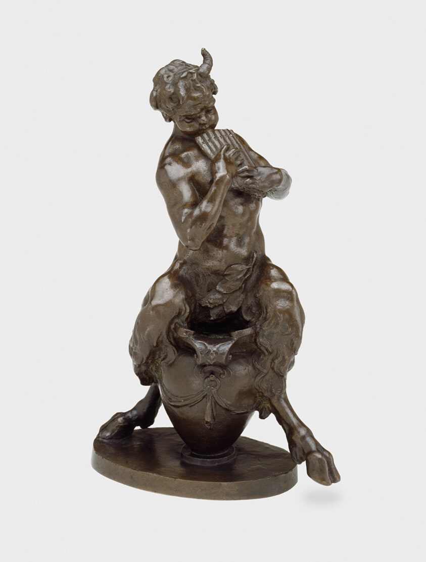 Pan Sitting on a Vase