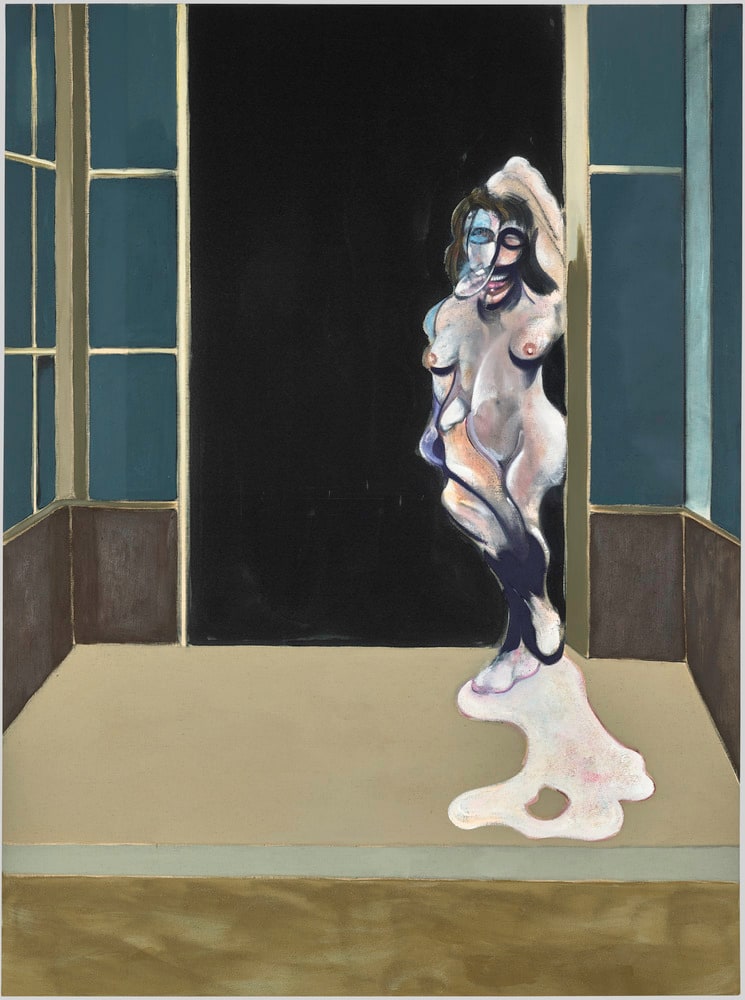 Female nude standing in doorway