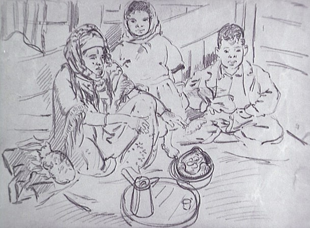Femme algérienne assise avec ses enfants