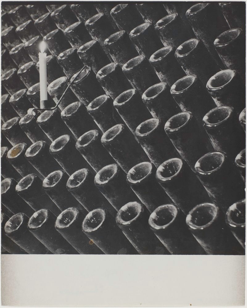 Bouteilles de champagne éclairées à la chandelle