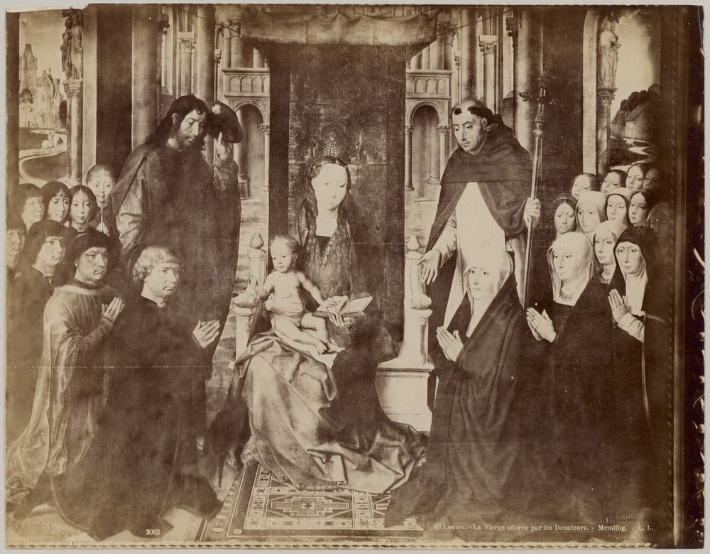 Huile sur bois "La Vierge et l'Enfant entre Saint Jacques et Saint Dominique présentant les donateurs et leur famille" - dite "La Vierge de Jacques Floreins" de Hans Memling, musée du Louvre, Paris
