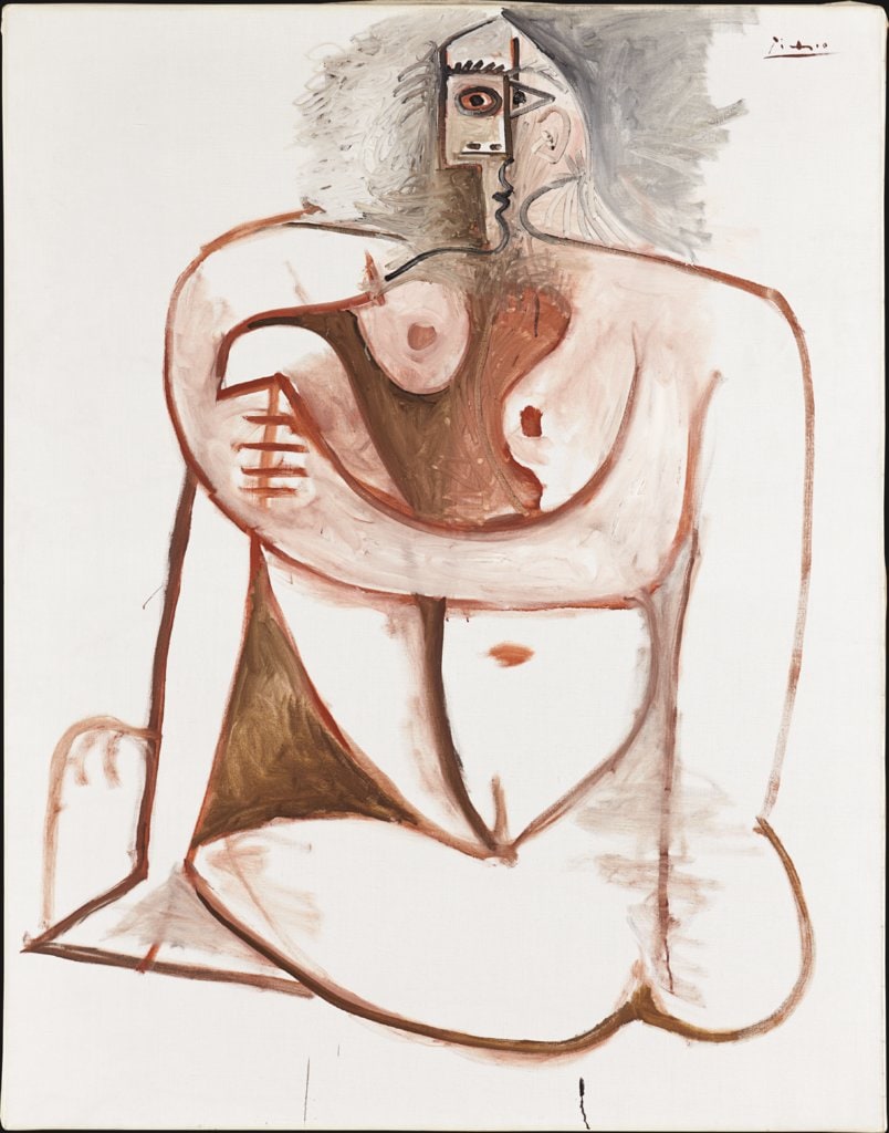 Femme accroupie
