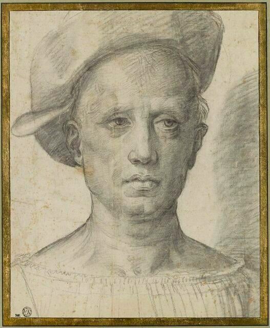 Tête d'homme, de face, coiffé d'un bonnet