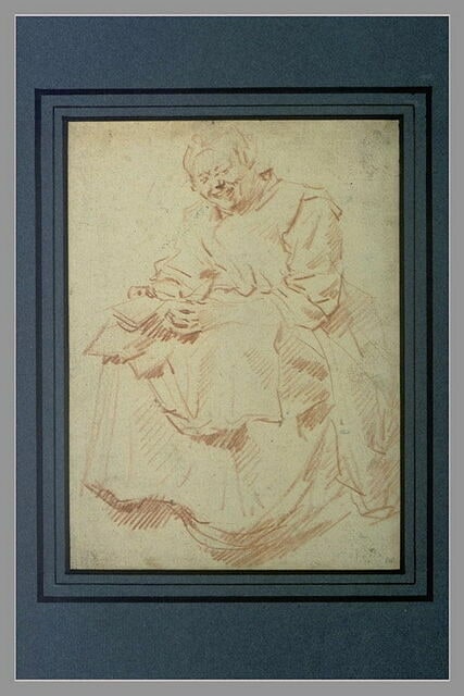 Une femme assise, souriant