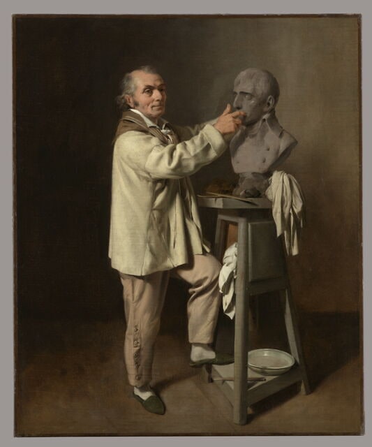 Portrait du sculpteur Jean Antoine Houdon dans son atelier, modelant le buste de Napoléon Bonaparte