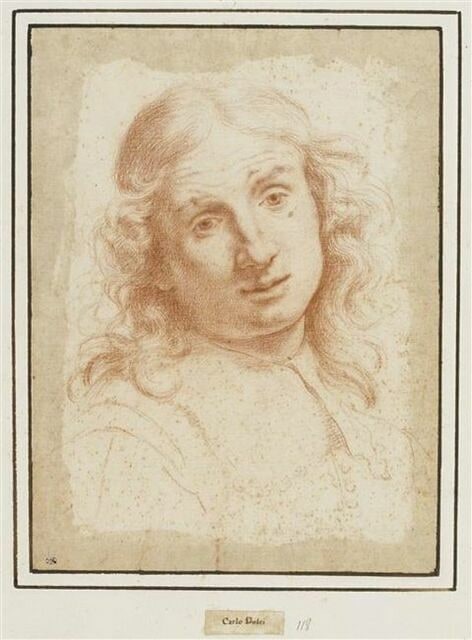 Tête d'homme aux cheveux longs vue de face