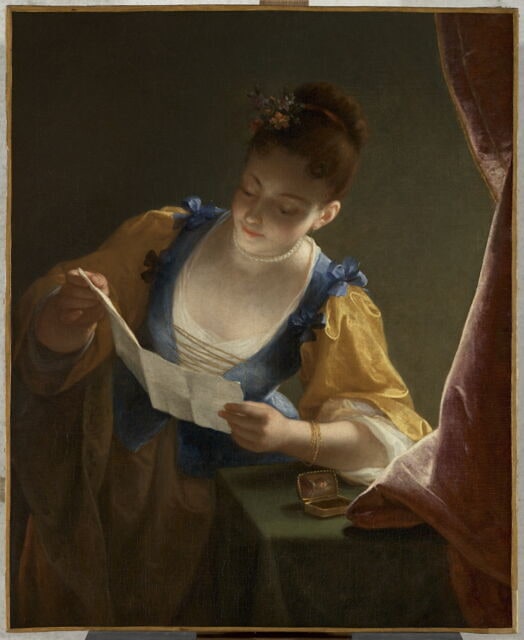 Jeune femme lisant une lettre