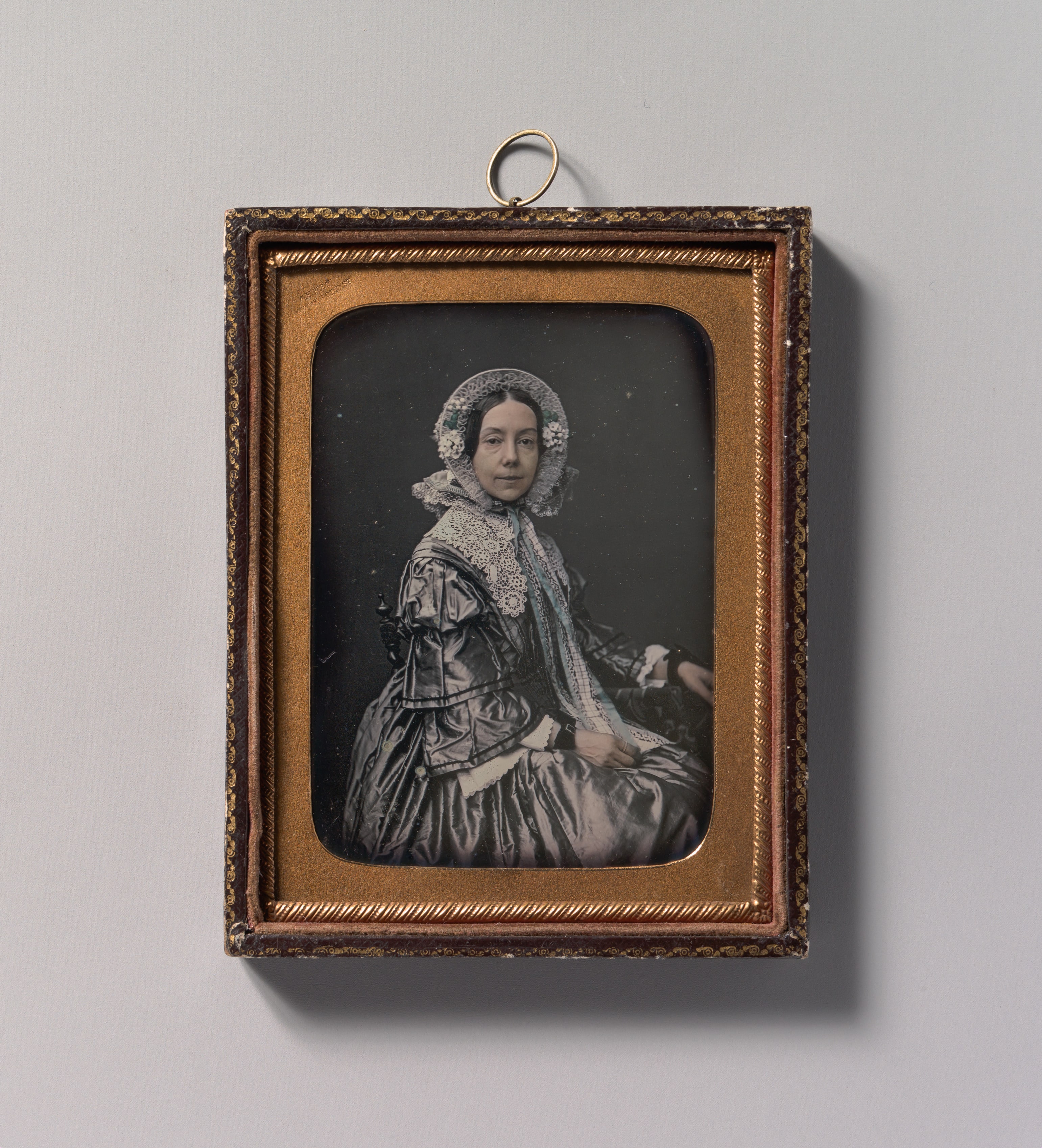 [Seated Middle-aged Woman Dressed in Finery]