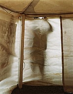 Man Looking in Revival Tent
