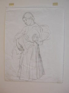 Standing woman carrying her child