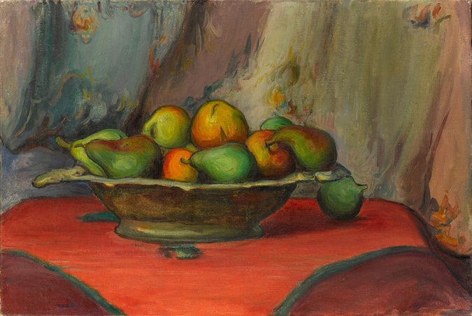 Coupe de fruits sur la nappe rouge