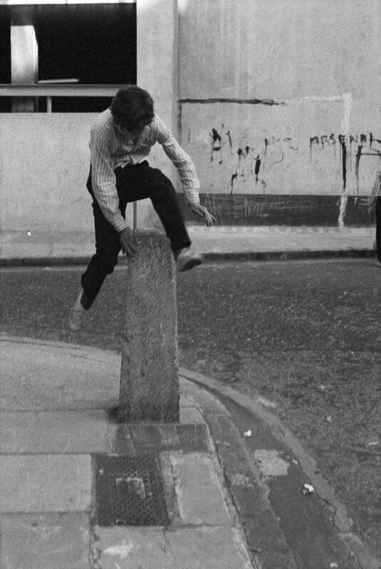 Boy playing leap frog