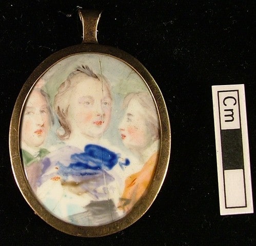 Trial Plaque of Three Heads